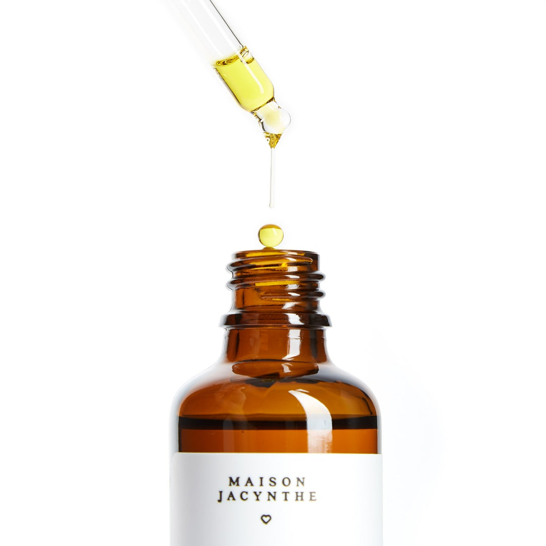 Pipette avec goutte tombante de l'Huile nettoyante de Maison Jacynthe